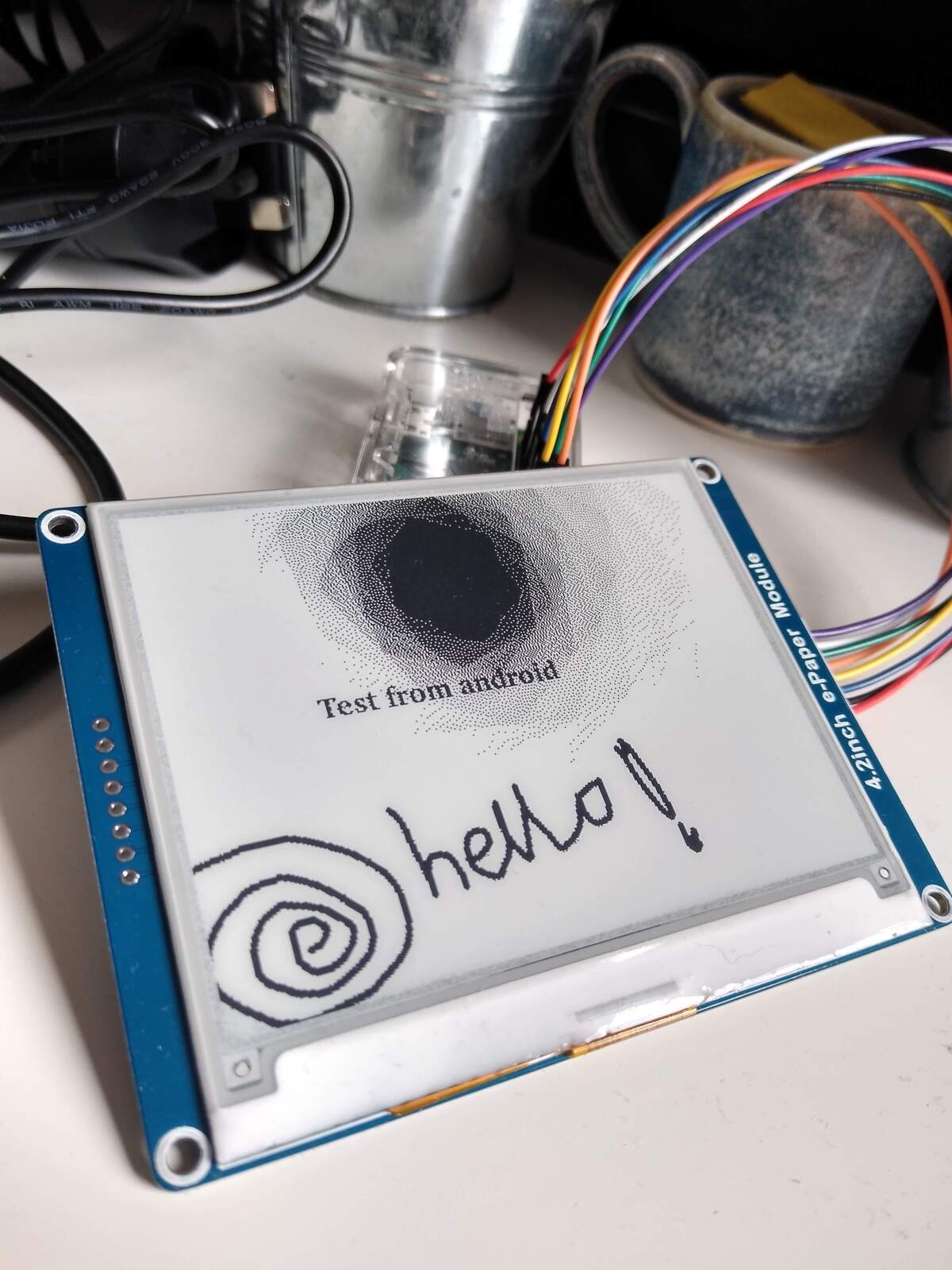 The innards of marco – the screen, attached to a PI zero, showing the ability to draw and add text to the screen